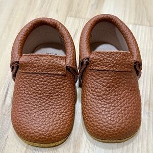 Monkey feet brown moccasins
